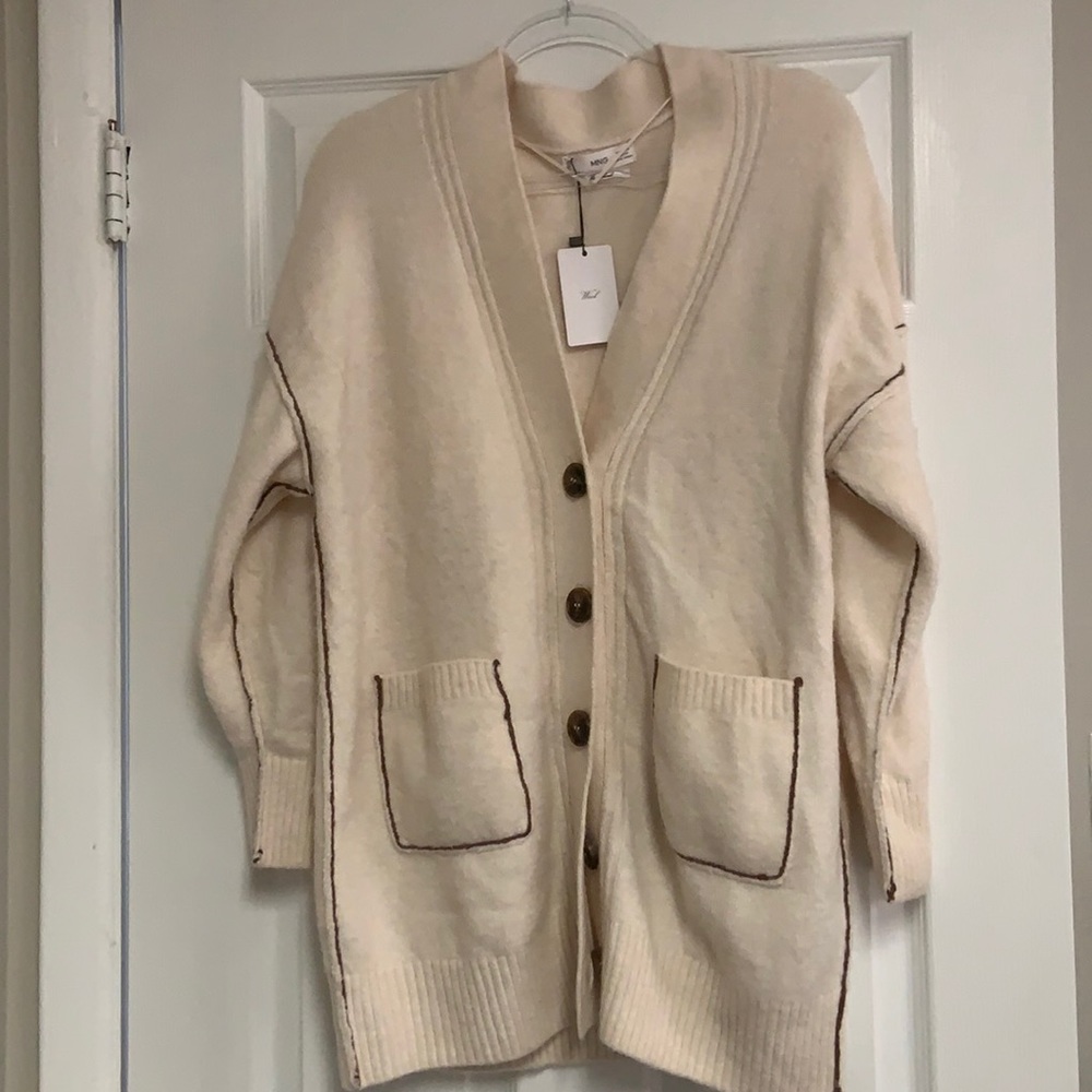Cream wool cardigan with pockets. Oversized chic fit with brown contrast